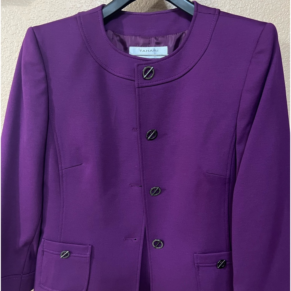Blazer and skirt suit set.